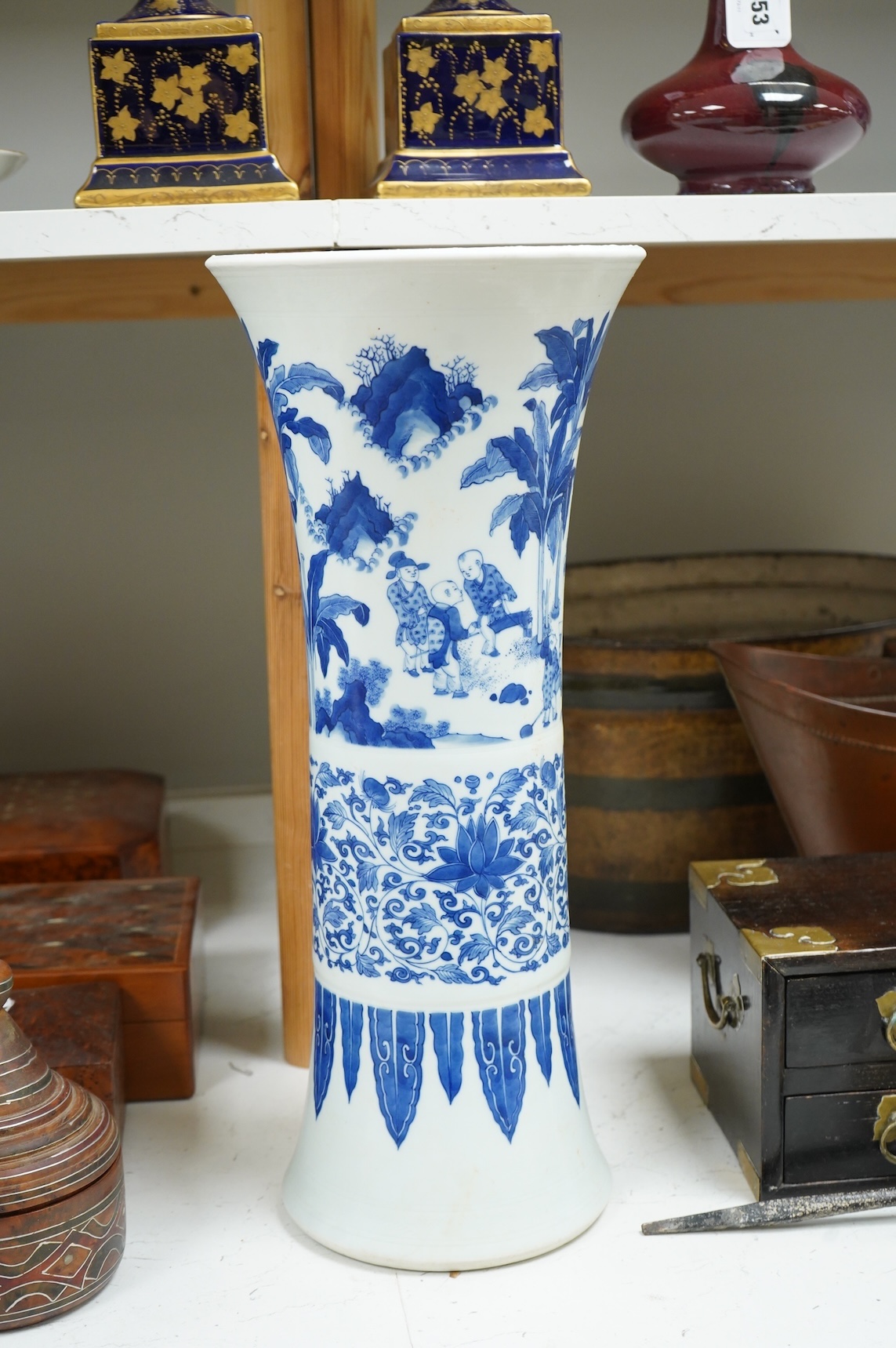 A large Chinese blue and white beaker vase, 45cm high